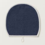 Small navy blue semi-circle floor mat.