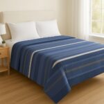 Stylish striped duvet cover in shades of blue and grey.